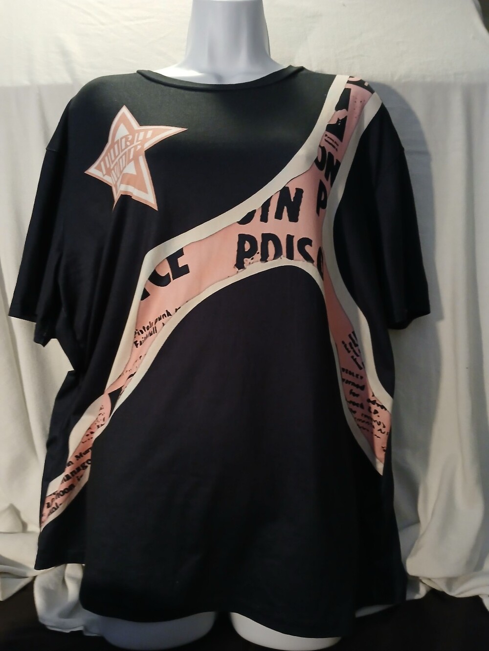 NWOT Women's Shein Black Tee with Pale Pink Graphic Panels.